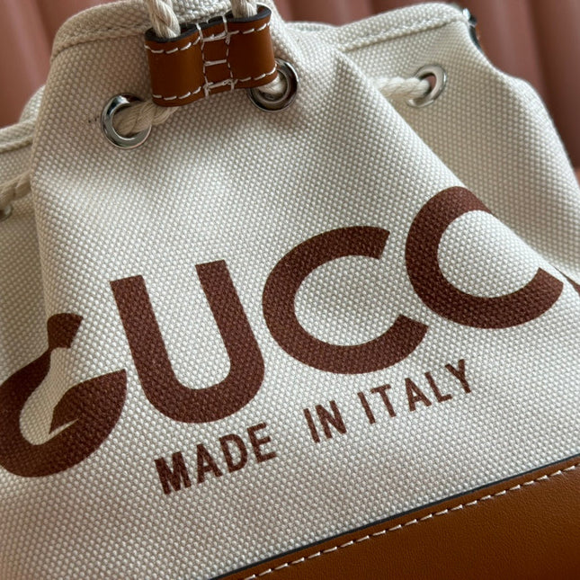 SMALL DRAWSTRING SHOULDER BAG 21 IN WHITE CANVAS BROWN CALFSKIN