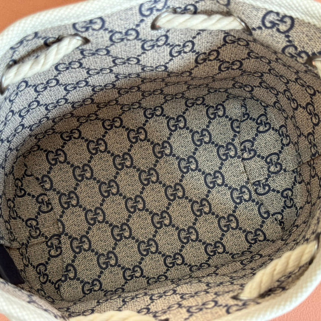 SMALL DRAWSTRING SHOULDER BAG 21 IN WHITE CANVAS DARK BLUE CALFSKIN