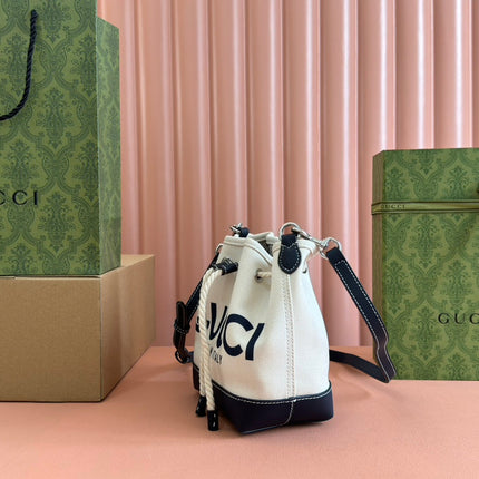 SMALL DRAWSTRING SHOULDER BAG 21 IN WHITE CANVAS DARK BLUE CALFSKIN