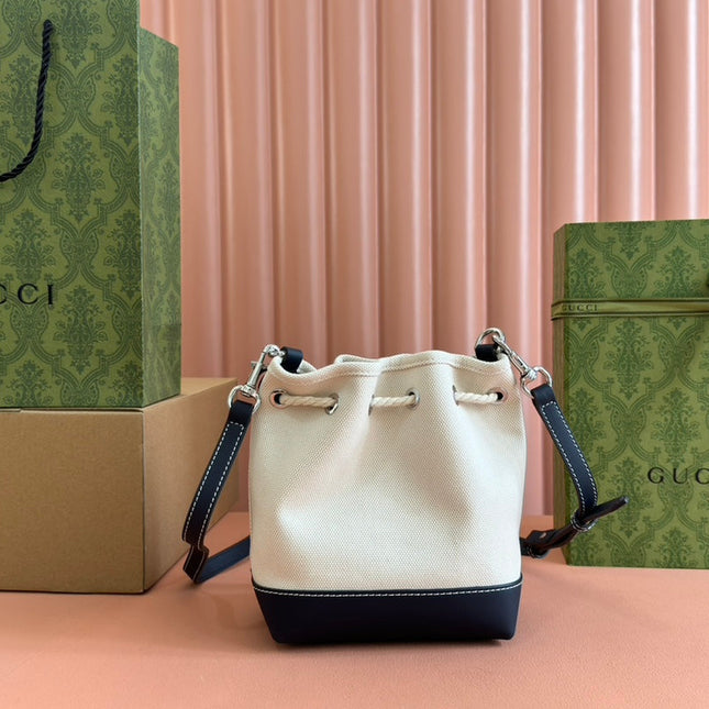 SMALL DRAWSTRING SHOULDER BAG 21 IN WHITE CANVAS DARK BLUE CALFSKIN