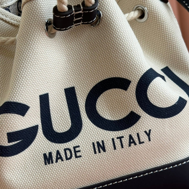 SMALL DRAWSTRING SHOULDER BAG 21 IN WHITE CANVAS DARK BLUE CALFSKIN