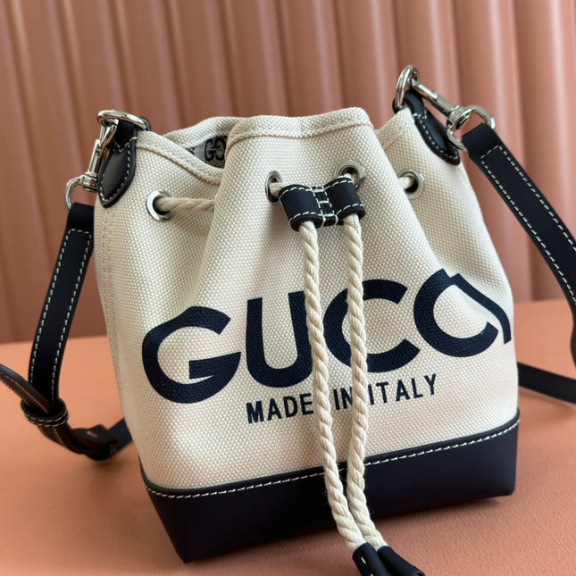 SMALL DRAWSTRING SHOULDER BAG 21 IN WHITE CANVAS DARK BLUE CALFSKIN