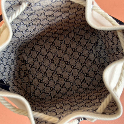 DRAWSTRING SHOULDER BAG LOGO PRINT 31 IN WHITE CANVAS DARK BLUE CALFSKIN