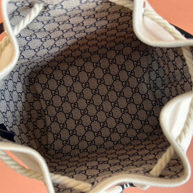 DRAWSTRING SHOULDER BAG LOGO PRINT 31 IN WHITE CANVAS DARK BLUE CALFSKIN