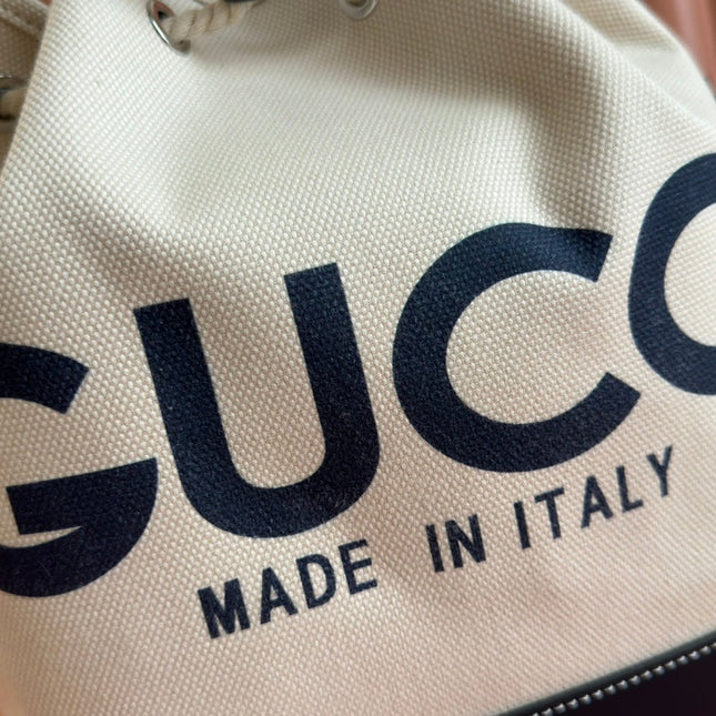 DRAWSTRING SHOULDER BAG LOGO PRINT 31 IN WHITE CANVAS DARK BLUE CALFSKIN