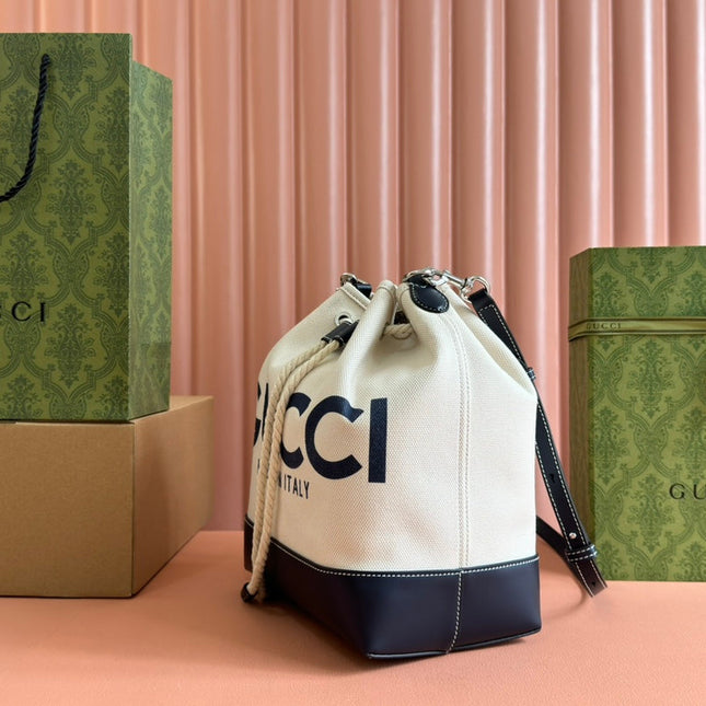 DRAWSTRING SHOULDER BAG LOGO PRINT 31 IN WHITE CANVAS DARK BLUE CALFSKIN