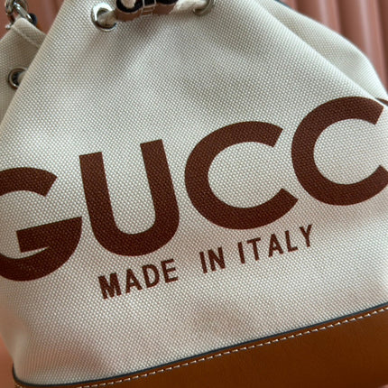 DRAWSTRING SHOULDER BAG LOGO PRINT 31 IN WHITE CANVAS BROWN CALFSKIN