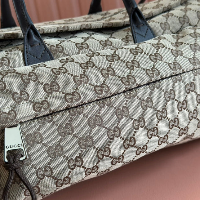 GG SMALL DUFFLE BAG 42 IN BEIGE AND DARK BROWN GG CANVAS