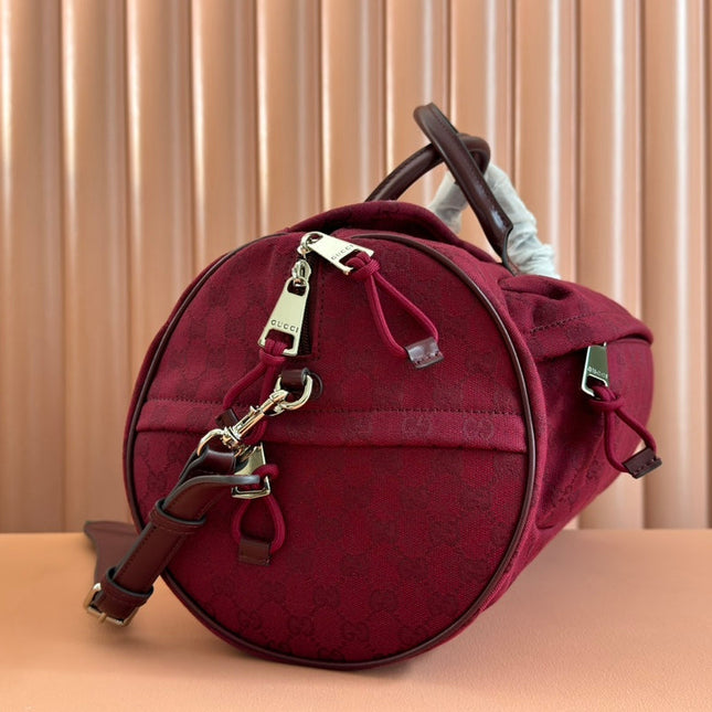 GG SMALL DUFFLE BAG 42 IN ROSSO ANCORA RED GG CANVAS