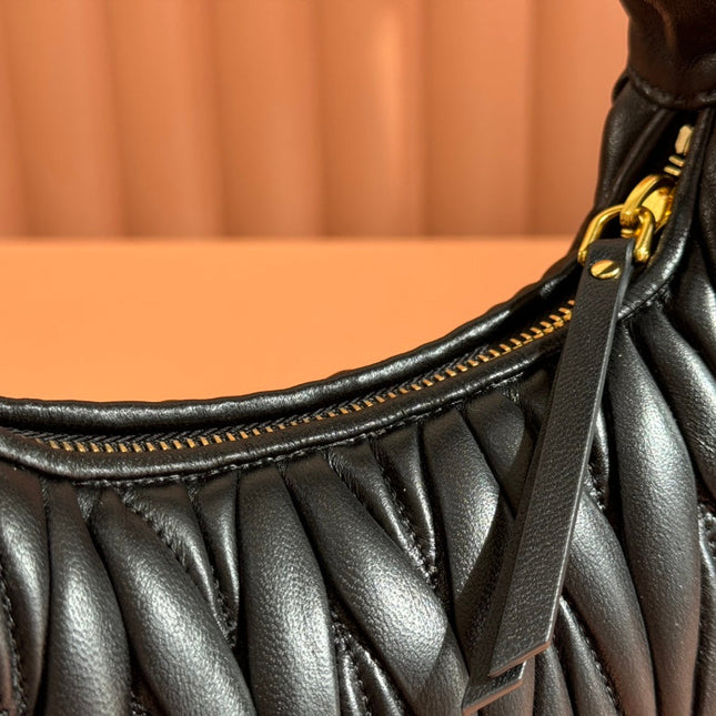 WANDER MATELASSÉ HANDBAG 23 IN BLACK LAMBSKIN
