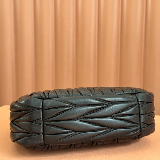 WANDER MATELASSÉ HANDBAG 23 IN BLACK LAMBSKIN