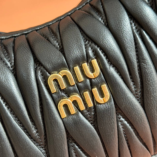 WANDER MATELASSÉ HANDBAG 23 IN BLACK LAMBSKIN