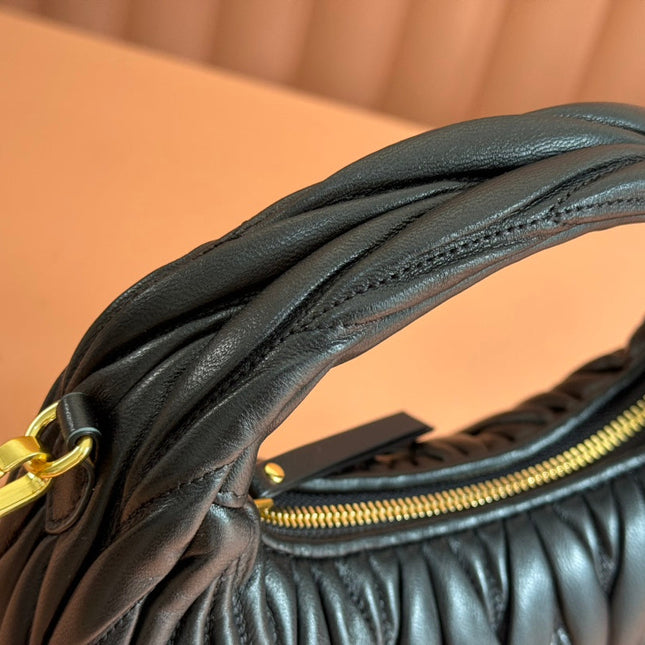 WANDER MATELASSÉ HANDBAG 23 IN BLACK LAMBSKIN