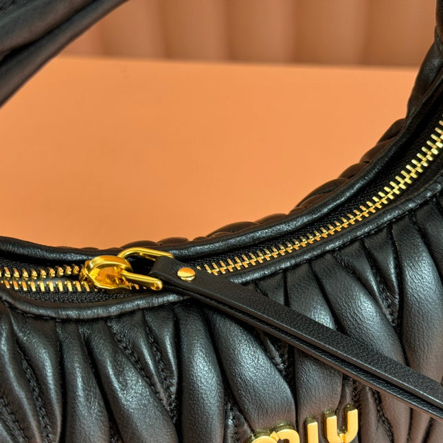 WANDER MATELASSÉ HANDBAG 23 IN BLACK LAMBSKIN