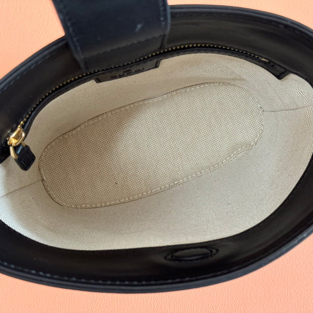 73 SMALL BUCKET BAG 20 IN NATURAL CANVAS AND BLACK CALFSKIN