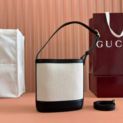 73 SMALL BUCKET BAG 20 IN NATURAL CANVAS AND BLACK CALFSKIN