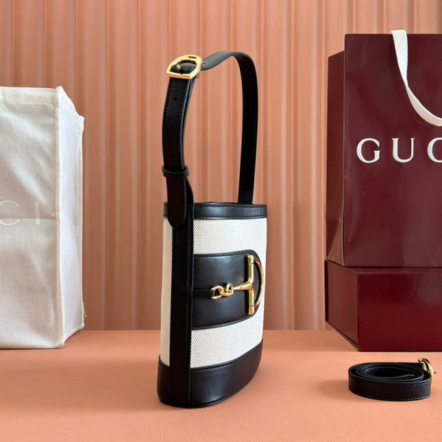 73 SMALL BUCKET BAG 20 IN NATURAL CANVAS AND BLACK CALFSKIN