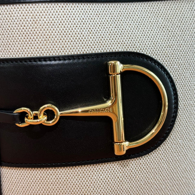 73 SMALL BUCKET BAG 20 IN NATURAL CANVAS AND BLACK CALFSKIN