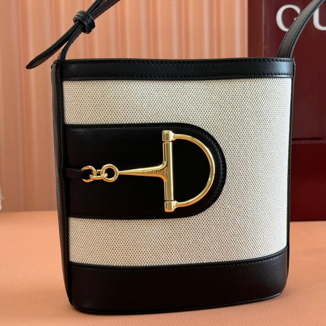 73 SMALL BUCKET BAG 20 IN NATURAL CANVAS AND BLACK CALFSKIN