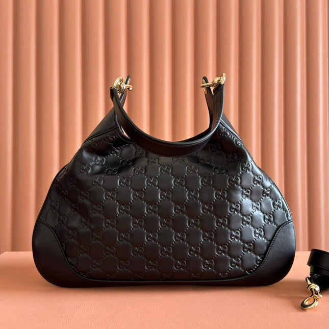 MEDIUM B SHOULDER BAG IN BLACK CALFSKIN GOLD HARDWARE