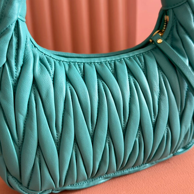 WANDER MATELASSÉ HANDBAG 23 IN LAGOON BLUE LAMBSKIN