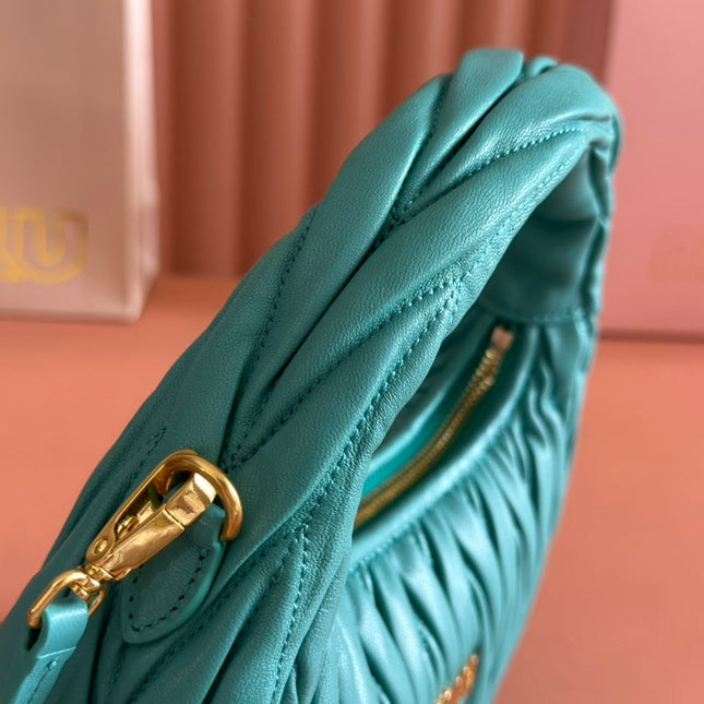 WANDER MATELASSÉ HANDBAG 23 IN LAGOON BLUE LAMBSKIN