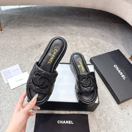 WEDGE HEELS IN BLACK CALFSKIN QUILTED