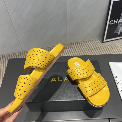 ALAIA CHUNKY TWO-STRAP SLIDES 25S IN YELLOW CALFSKIN