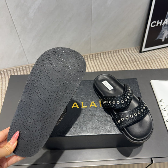 ALAIA DOUBLE-STRAP SANDALS 25S IN BLACK CALFSKIN