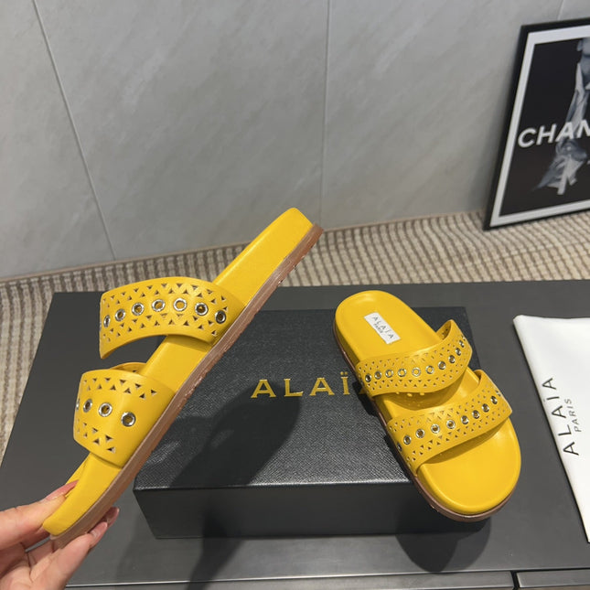ALAIA DOUBLE-STRAP SANDALS 25S IN YELLOW CALFSKIN