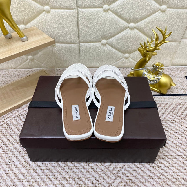 ALAIA BREATHABLE FLAT-TOE MULES 25S IN WHITE CALFSKIN