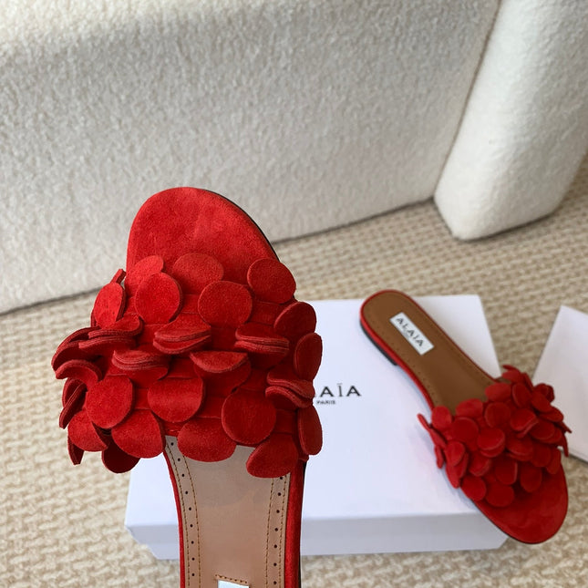 ALAIA FLAT MULE IN CHERRY RED SUEDE