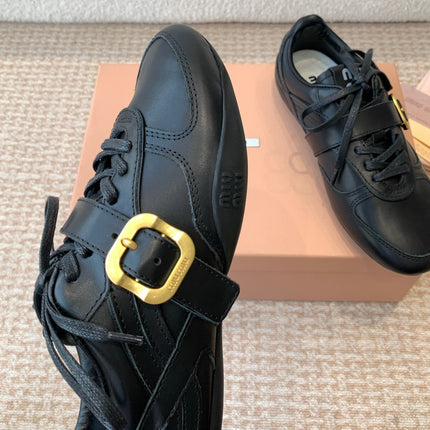 GYMNASIUM SNEAKER IN BLACK CALFSKIN WITH GOLD BUCKLED STRAP