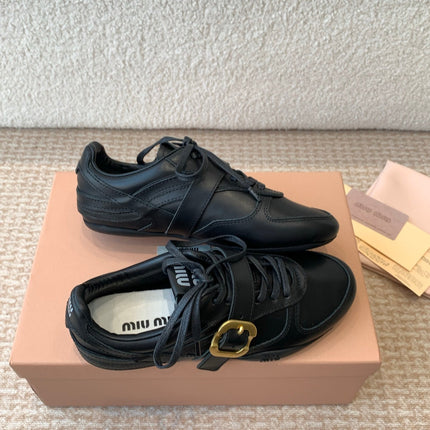 GYMNASIUM SNEAKER IN BLACK CALFSKIN WITH GOLD BUCKLED STRAP