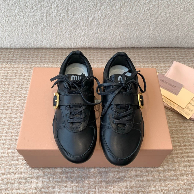 GYMNASIUM SNEAKER IN BLACK CALFSKIN WITH GOLD BUCKLED STRAP