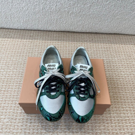 GYMNASIUM SNEAKER IN SILVER FABRIC AND DARK GREEN SNAKE EFFECT CALFSKIN