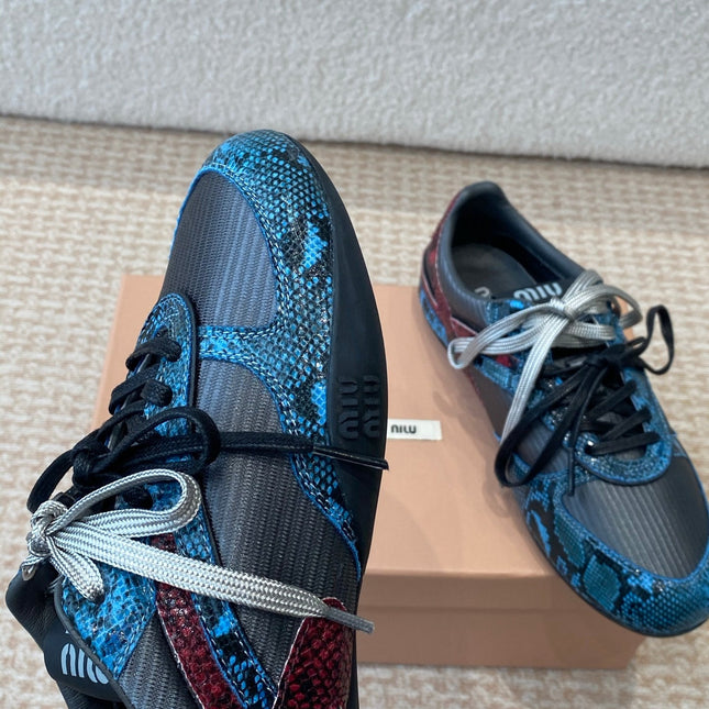 GYMNASIUM SNEAKER IN BLACK FABRIC AND BLUE SNAKE EFFECT CALFSKIN