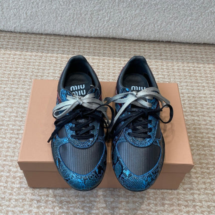 GYMNASIUM SNEAKER IN BLACK FABRIC AND BLUE SNAKE EFFECT CALFSKIN
