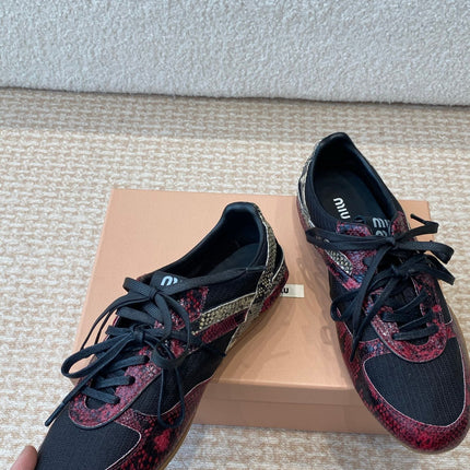 GYMNASIUM SNEAKER IN BLACK FABRIC AND BLACK RED SNAKE EFFECT CALFSKIN