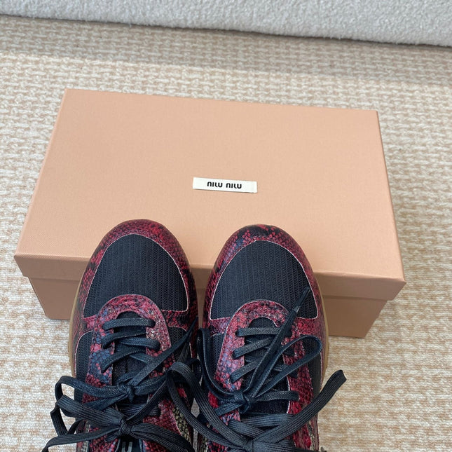 GYMNASIUM SNEAKER IN BLACK FABRIC AND BLACK RED SNAKE EFFECT CALFSKIN