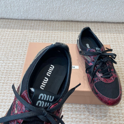 GYMNASIUM SNEAKER IN BLACK FABRIC AND BLACK RED SNAKE EFFECT CALFSKIN