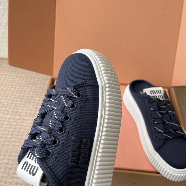 WASH SNEAKER MULES IN DARK NAVY DENIM