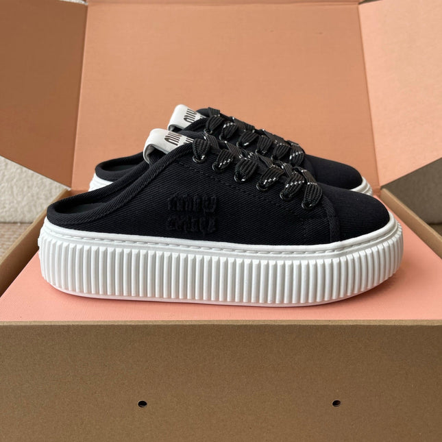 WASH SNEAKER MULES IN BLACK DENIM