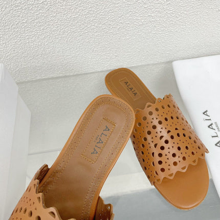 ALAIA VIENNE FLAT MULES IN CHOCOLATE BROWN LAMBSKIN
