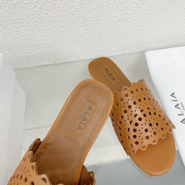 ALAIA VIENNE FLAT MULES IN CHOCOLATE BROWN LAMBSKIN