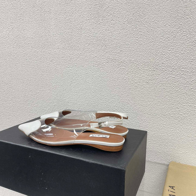 ALAIA LE COEUR FLAT SLINGBACKS IN WHITE PATENT LAMBSKIN