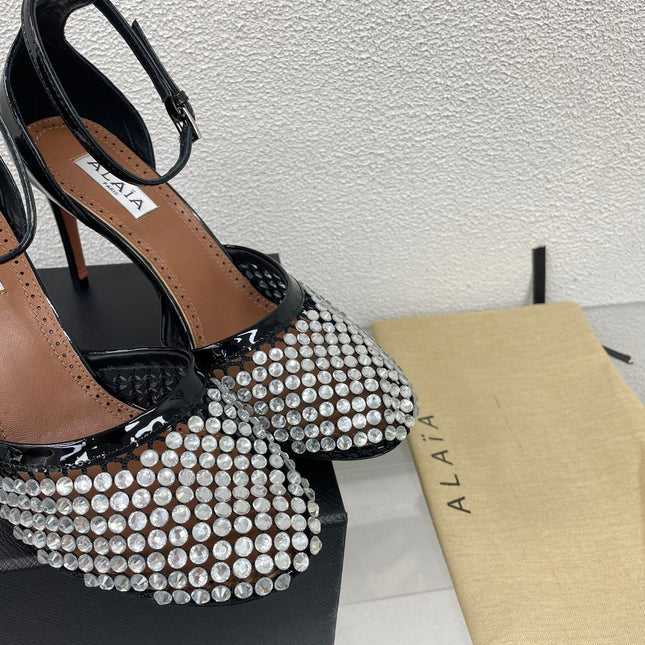 ALAIA HIGH FISHNET PUMPS IN BLACK MESH WITH WHITE RHINSTONES