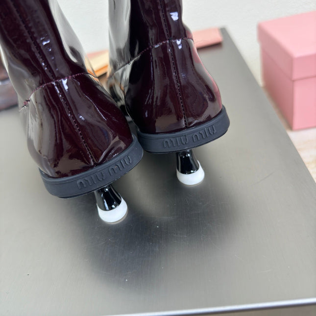 ANKLE POINTED-TOE BOOTS IN MAHOGANY GLOSSY CALFSKIN