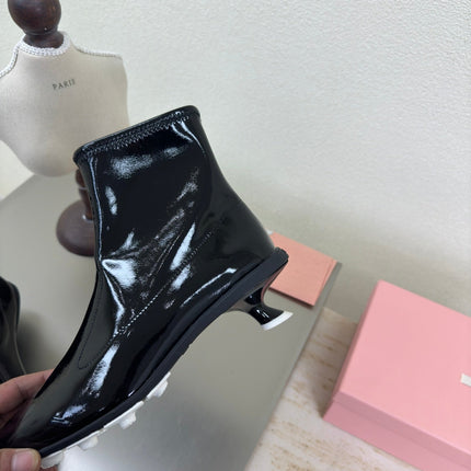 ANKLE POINTED-TOE BOOTS IN BLACK GLOSSY CALFSKIN