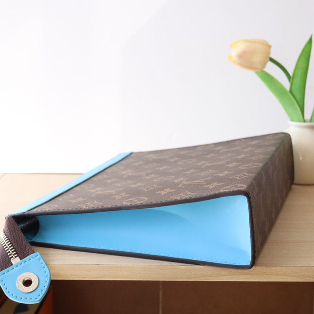 LV 25S POCHETTE VOYAGE 26 IN GASTON BLUE MONOGRAM MACASSAR COATED CANVAS